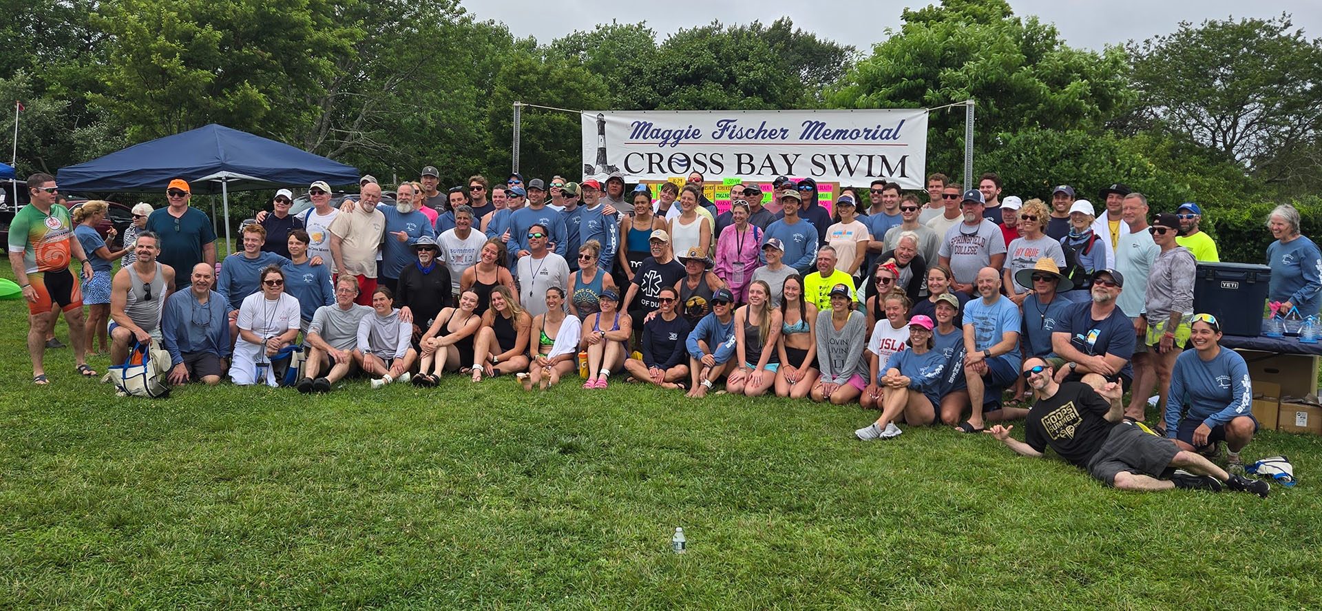 Swimmers crossing the Great South Bay escorted by kayakers
